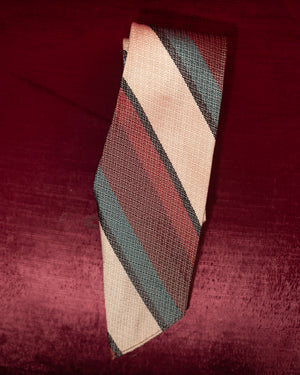 Striped tie on a textured red background
