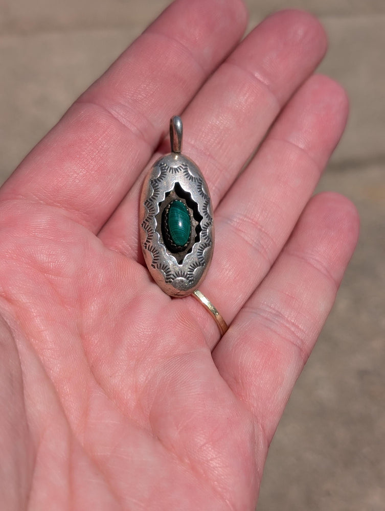 Vintage southwestern shadowbox pendant with Malachite center. Stamped with the Hallmark letter K