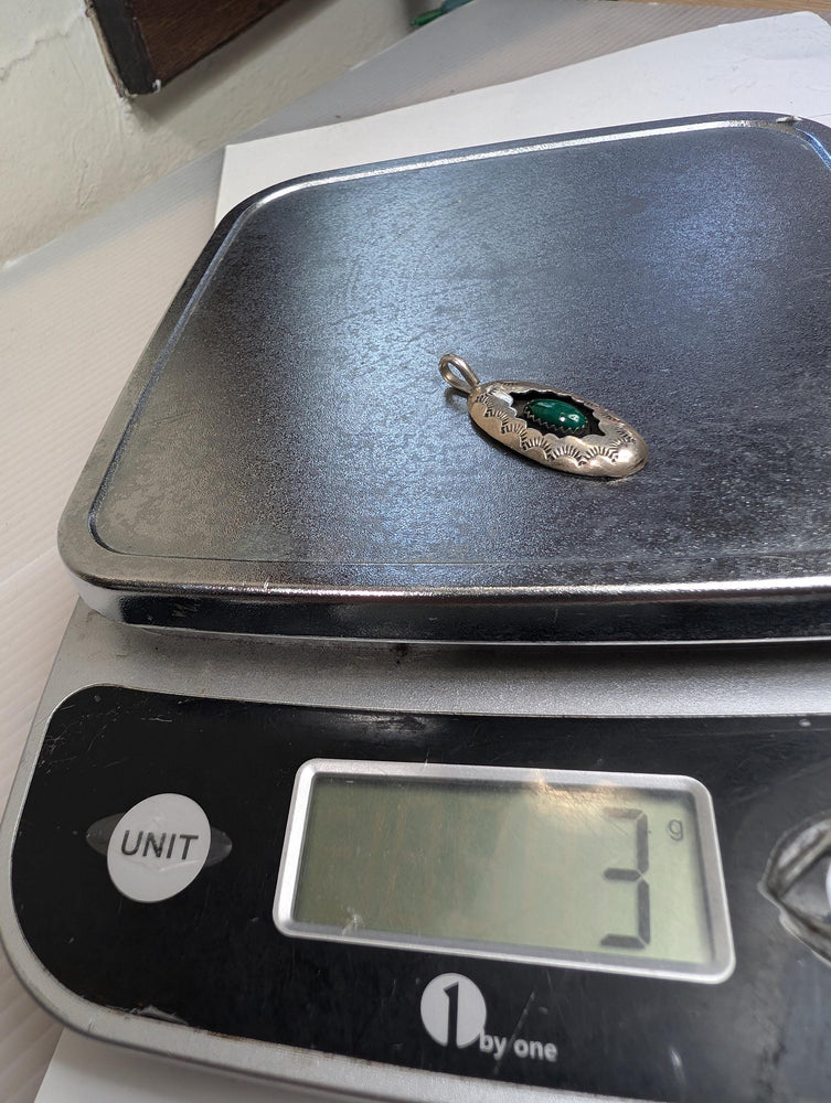 Vintage southwestern shadowbox pendant with Malachite center. Stamped with the Hallmark letter K