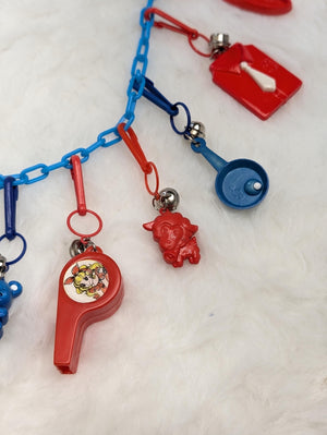 80s bell charm clip necklace full of color, fun, and kitsch! Blue and red