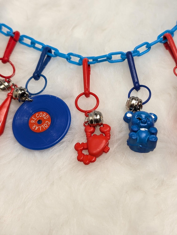 80s bell charm clip necklace full of color, fun, and kitsch! Blue and red