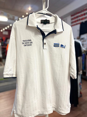 White polo shirt with text and logo on a hanger in a store setting